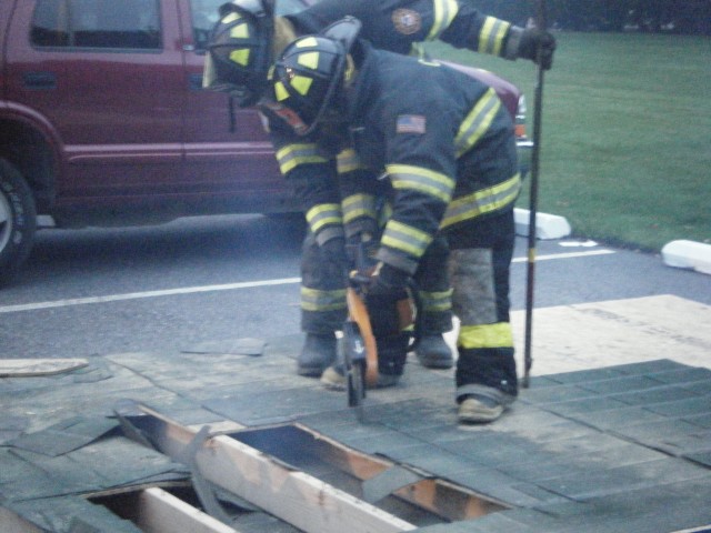 Probie K Mahoney working with the saw