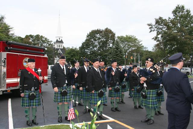 The Siol Na Heireann bagpipes, filled the air with the sounds of "Amazing Grace" in a solemn tribute to those who died.
